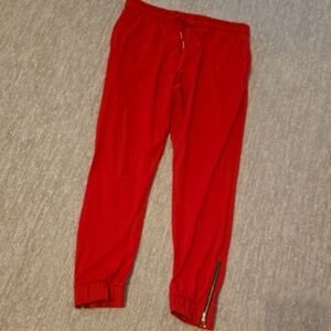 ZYIA Red Track Pants with Tapered Legs and Ankle Zippers